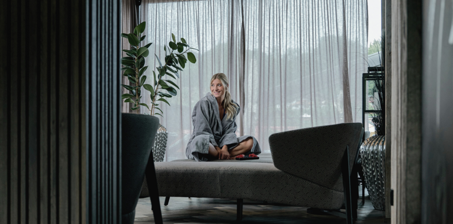 Woman on a lounger in a noble SPA area in the HOCHKÖNIGIN